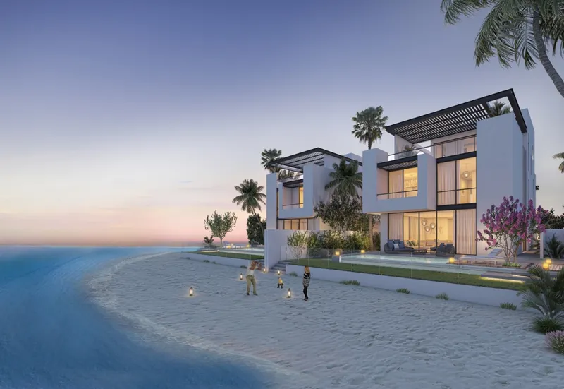 Sun Island villa on the shoreline at dusk