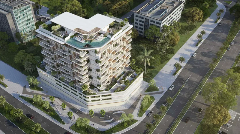 Aerial view of Sunset Bay Grand by Imtiaz with its rooftop pool and landscaped podium