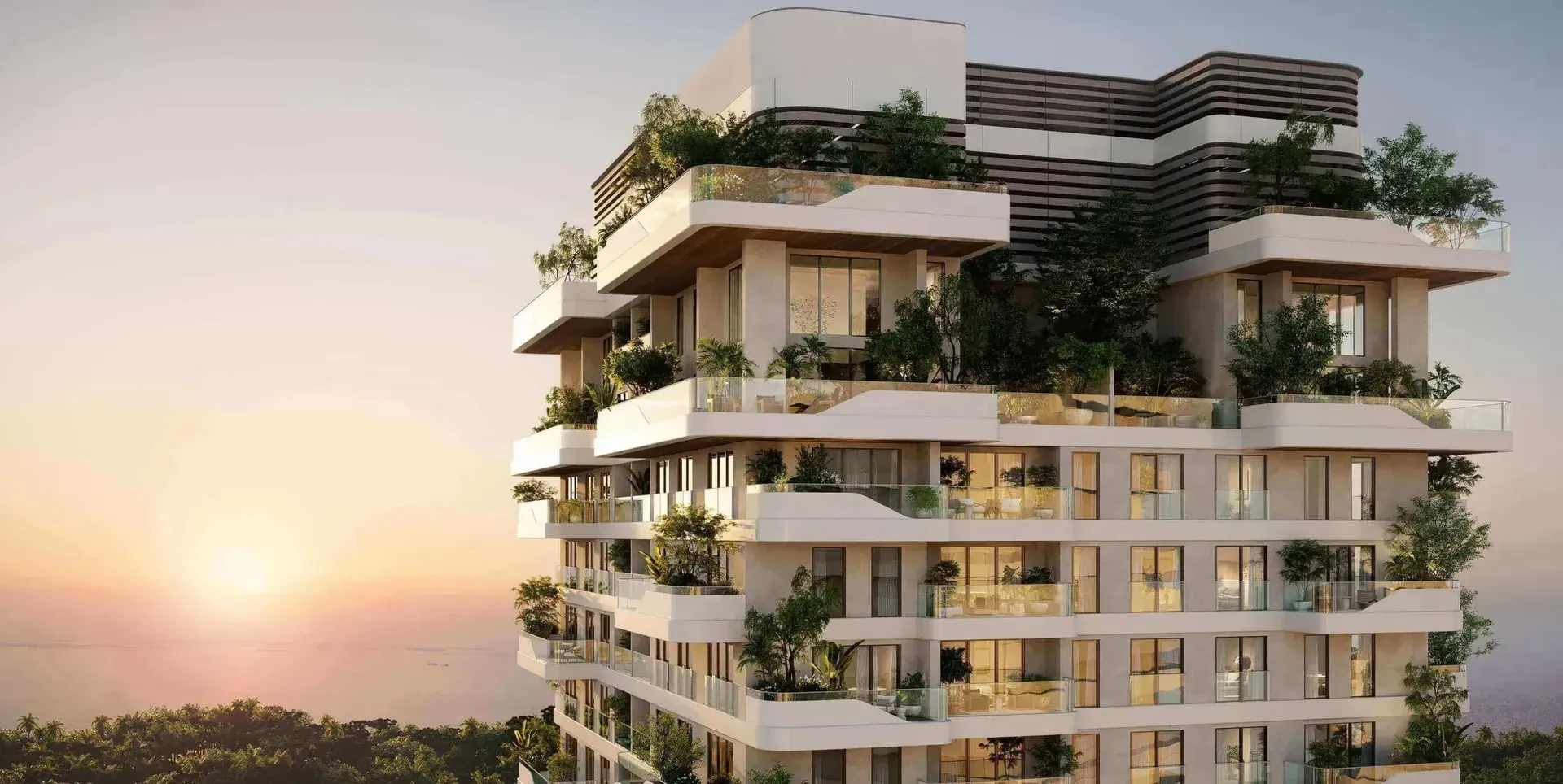 Upper floors of Talea by BEYOND with planted terraces at sunset, Dubai Maritime City