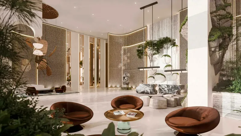 Double-height entrance lobby with planting at Talea