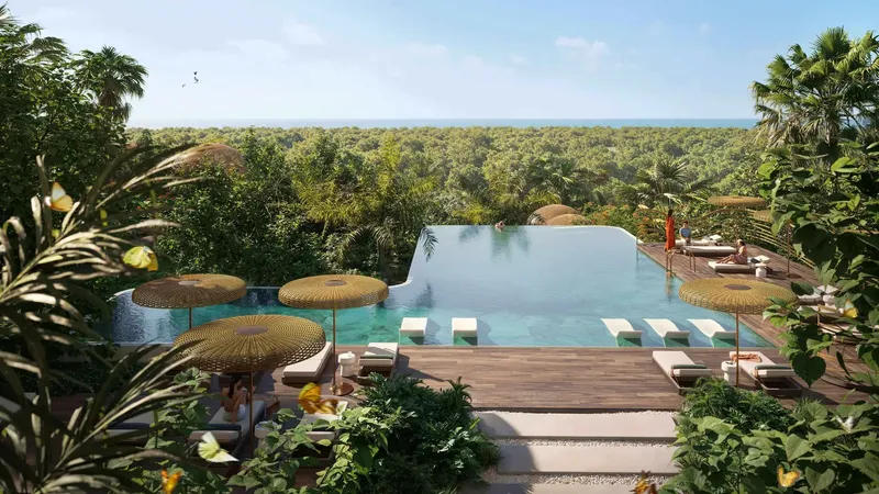 Infinity pool framed by trees at Talea by BEYOND