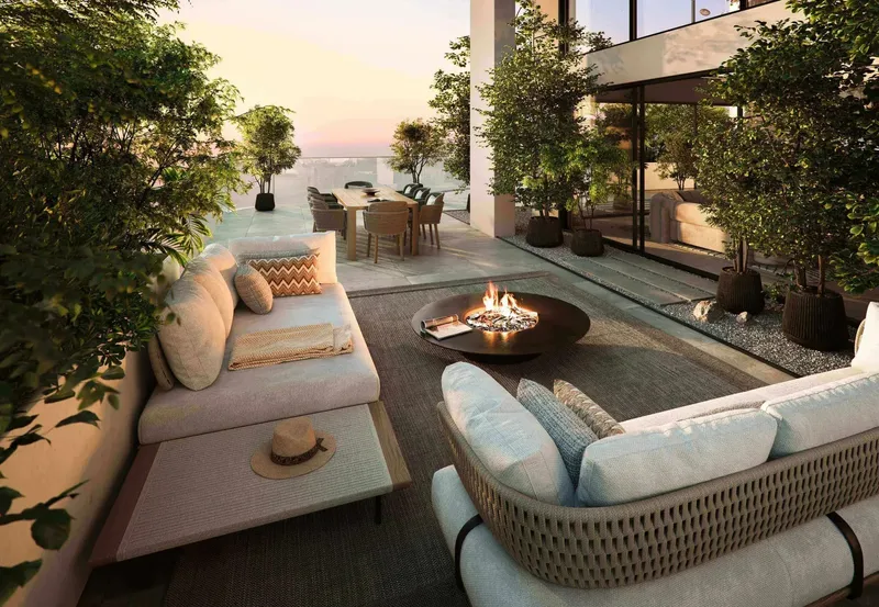 Planted private terrace with fire pit and lounge seating at Talea