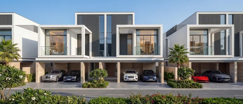Row of contemporary villas with carports and palm trees at The Brooks, Sobha Sanctuary