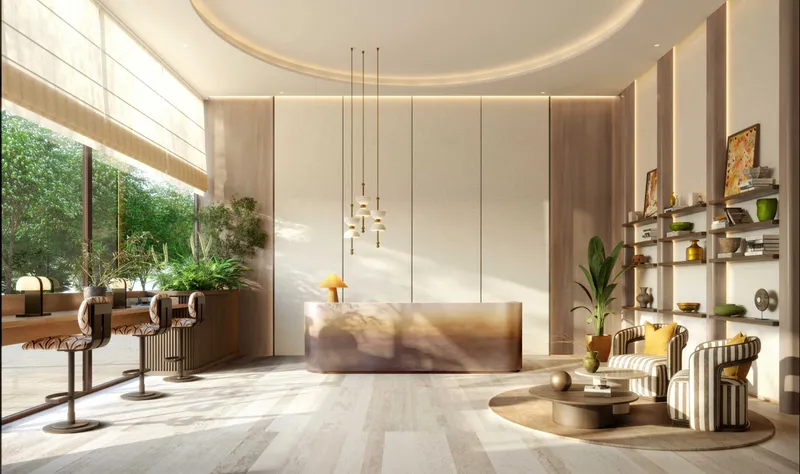 Residential lobby at The Canopies with a curved ceiling, reception desk and lounge seating