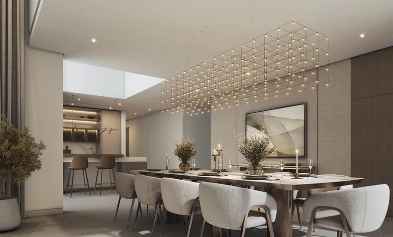 Dining room with a long table and a skylight in a villa at The Orchard