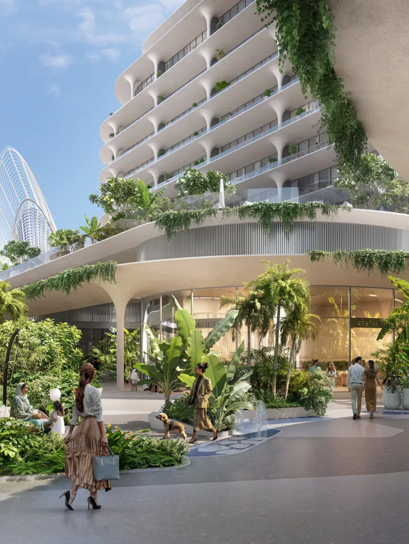 Render of the planted, shaded ground level at The Row Saadiyat beneath a terraced building