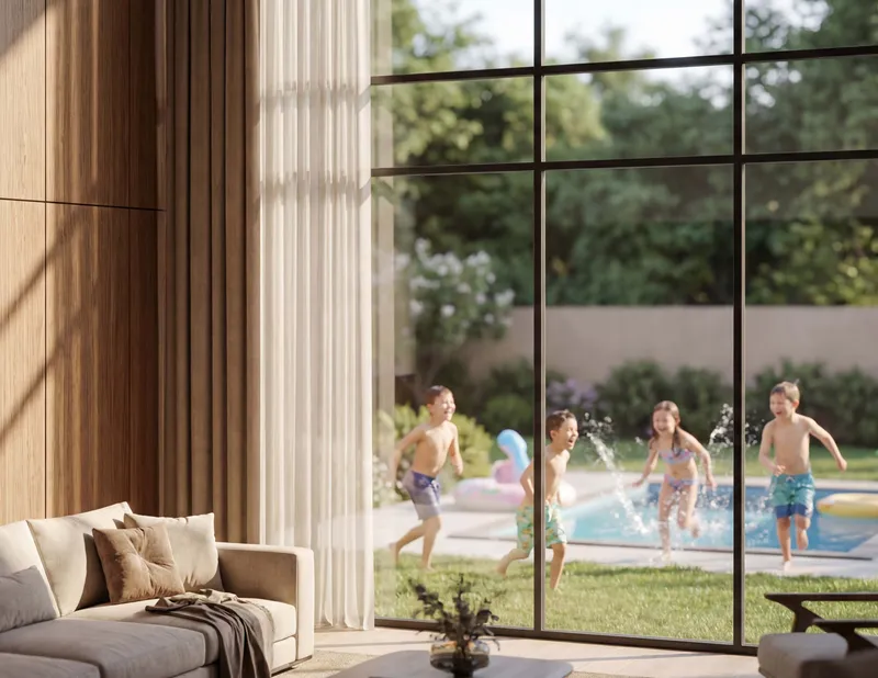 Render of a villa living room at The Terraces with full-height glazing opening onto a landscaped garden