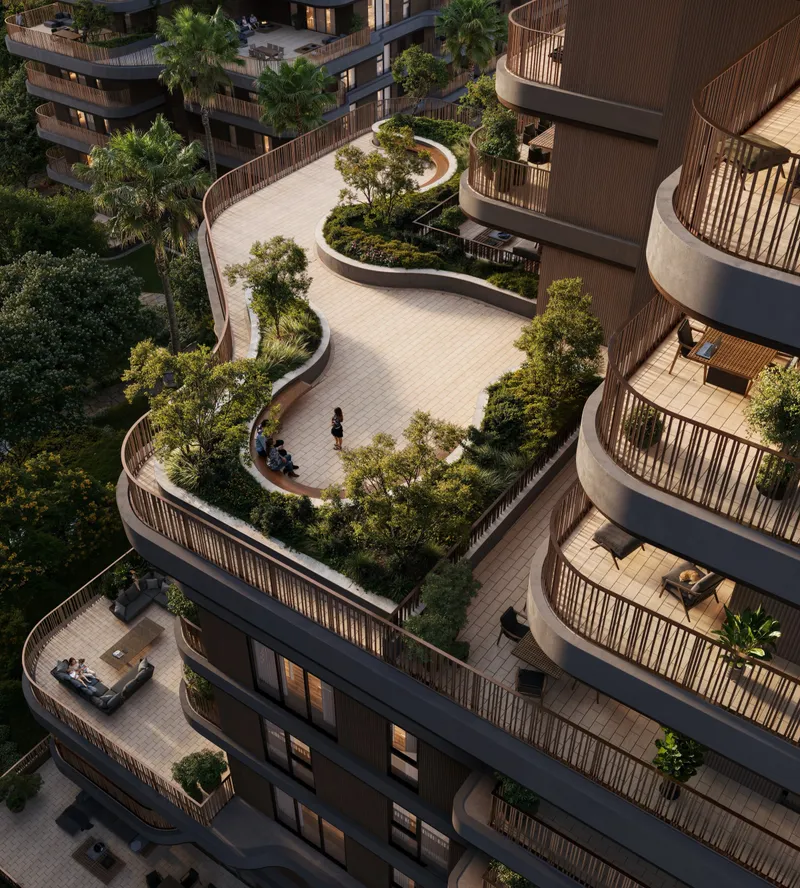 Aerial render of planted podium terraces and a winding path between The Wilds Residences buildings