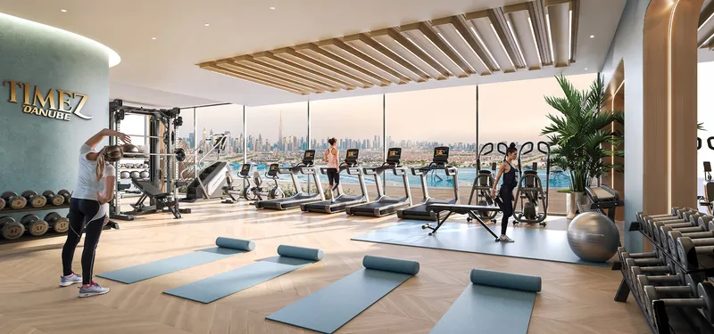 Indoor gym with city views at Timez by Danube