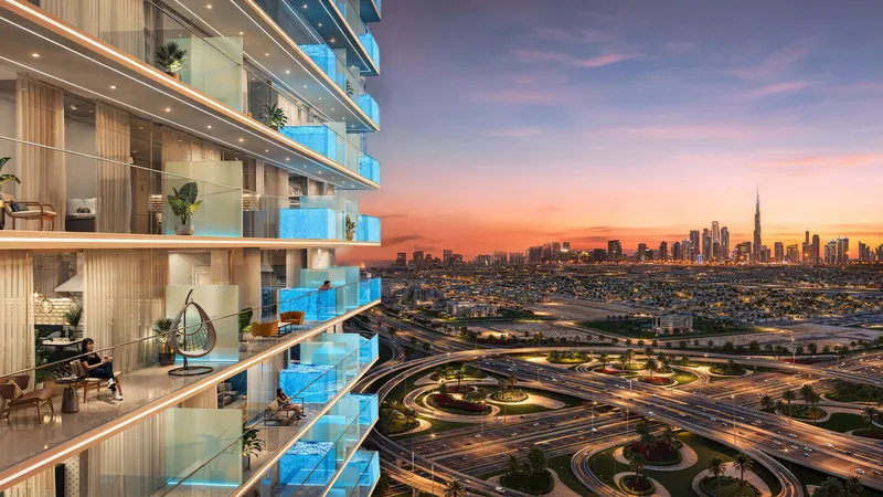 Private balcony pools on the Timez by Danube tower at dusk with the Dubai skyline