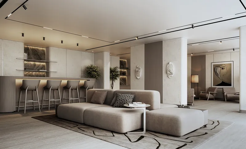Residents' lounge with sofas and a bar counter at Tranquil Beach Residences