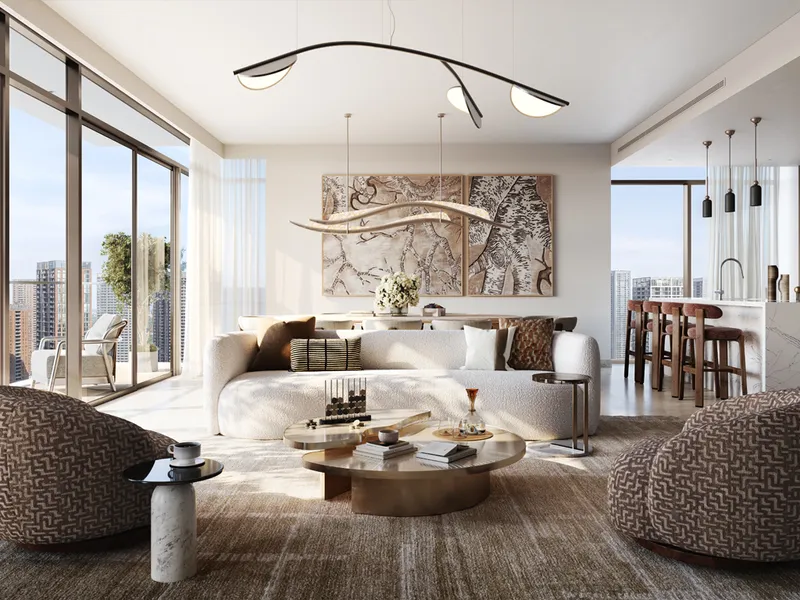 Interior render of an open-plan Valia living room with a kitchen counter and tall windows