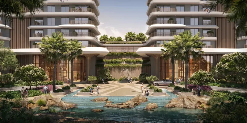 Render of the Verdes by Haven entrance court with a water feature and palm trees