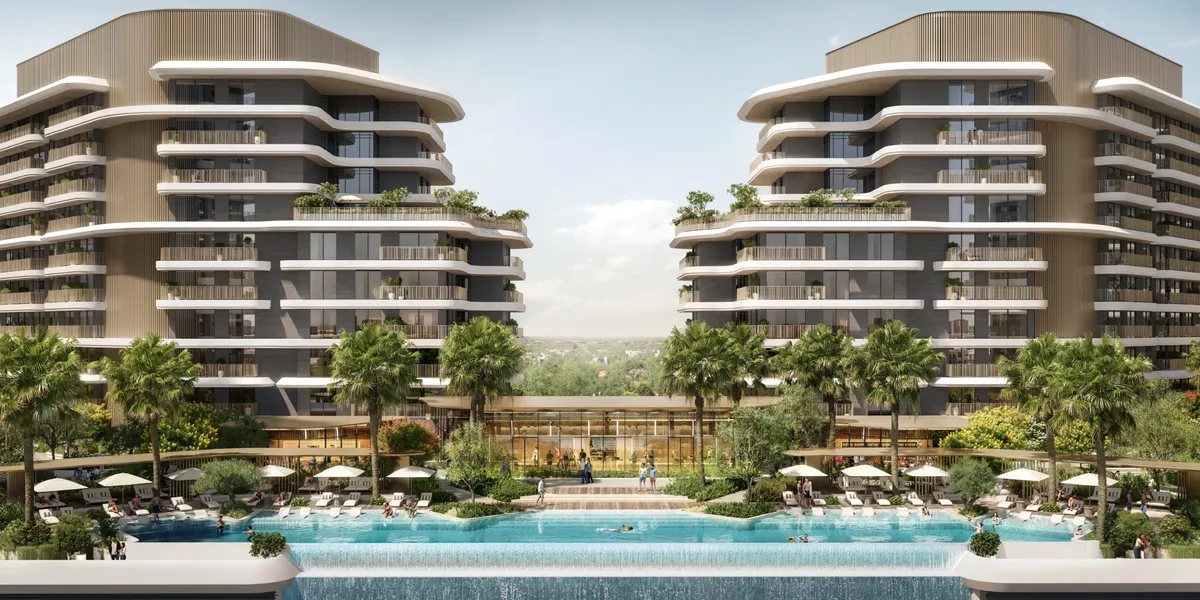 Render of the Verdes by Haven pool deck with loungers between two buildings