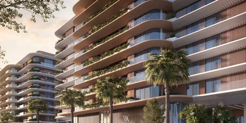 Render of the Waldorf Astoria Residences Yas facade with curved balconies, timber-toned screens and planting, palms at street level