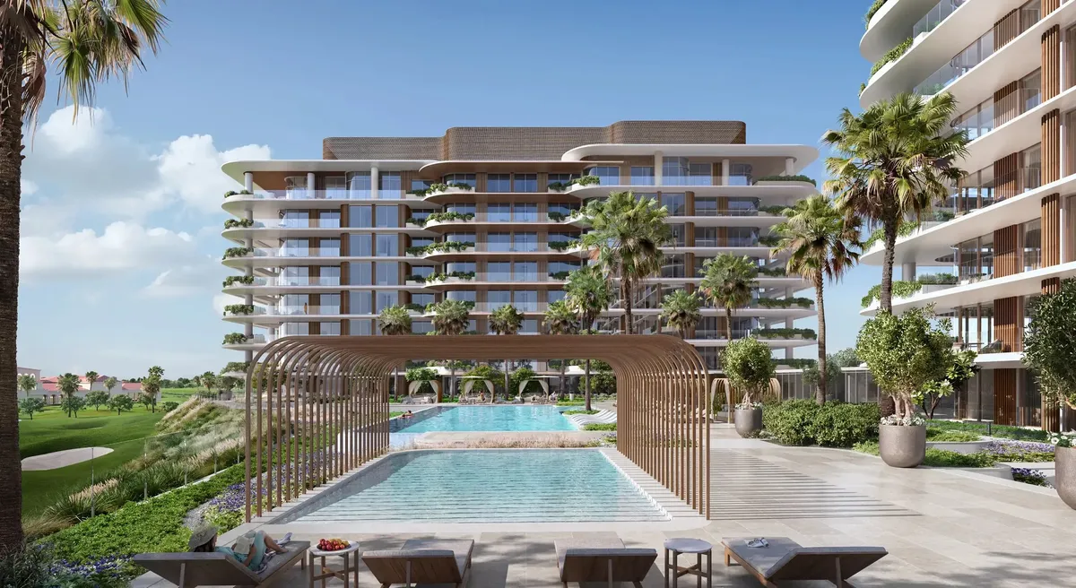 Render of the residents' pool at Waldorf Astoria Residences Yas with a pergola, loungers and a residential building behind
