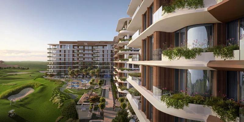 Render looking from the planted terraces of Waldorf Astoria Residences Yas over the landscaped gardens to the golf course