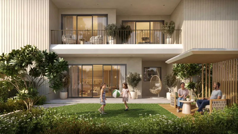 Render of a ground-level Yas Park Place home with a private lawn, shaded seating and a balcony above