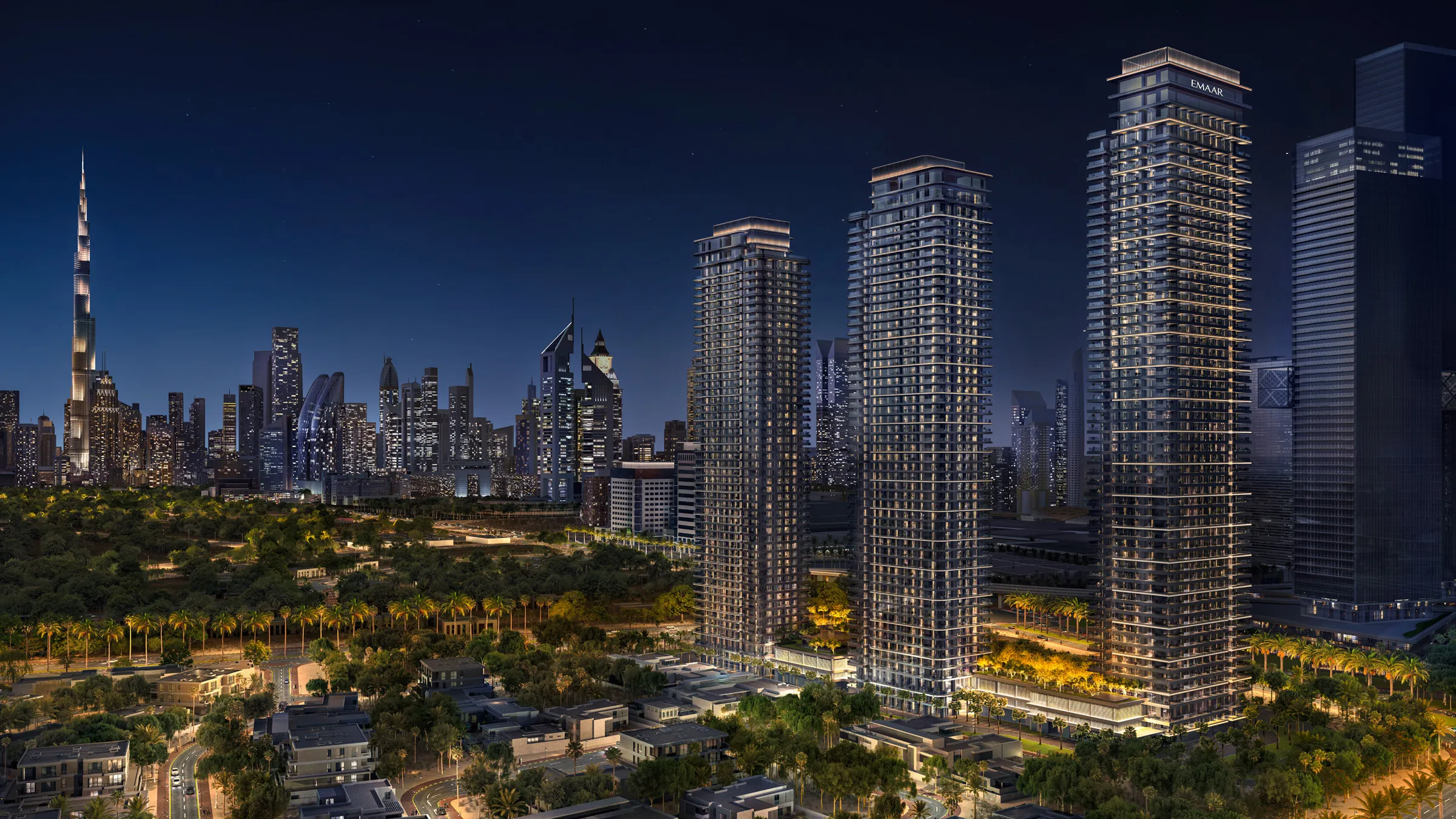 Night render of the four Address Residences Zabeel towers with Burj Khalifa and the Downtown Dubai skyline behind