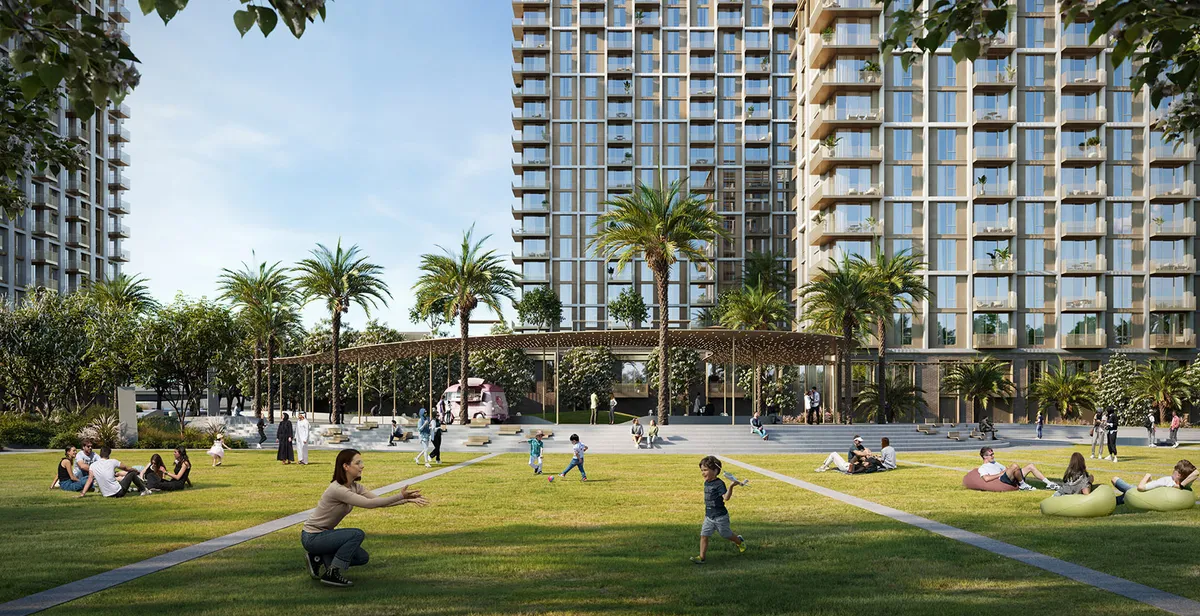 Render of residents on the lawn in front of the Aeon buildings