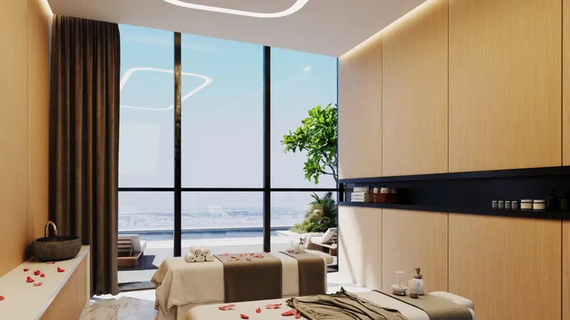 Spa treatment room with timber walls and a city view at Al Habtoor Tower