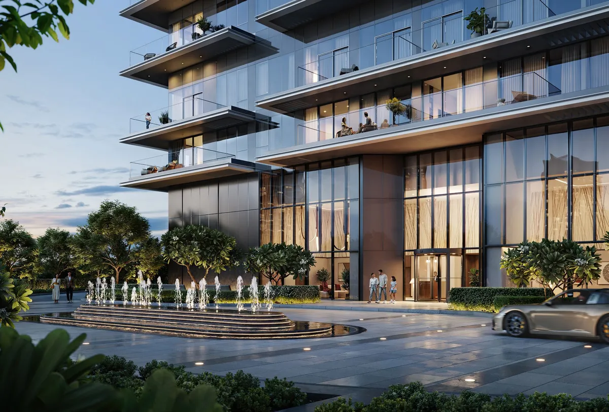 Render of the Albero entrance at dusk with a fountain and landscaped drop-off