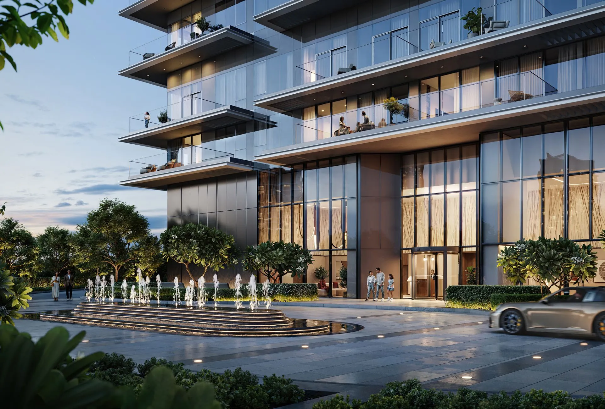 Render of the Albero entrance at dusk with a fountain and landscaped drop-off
