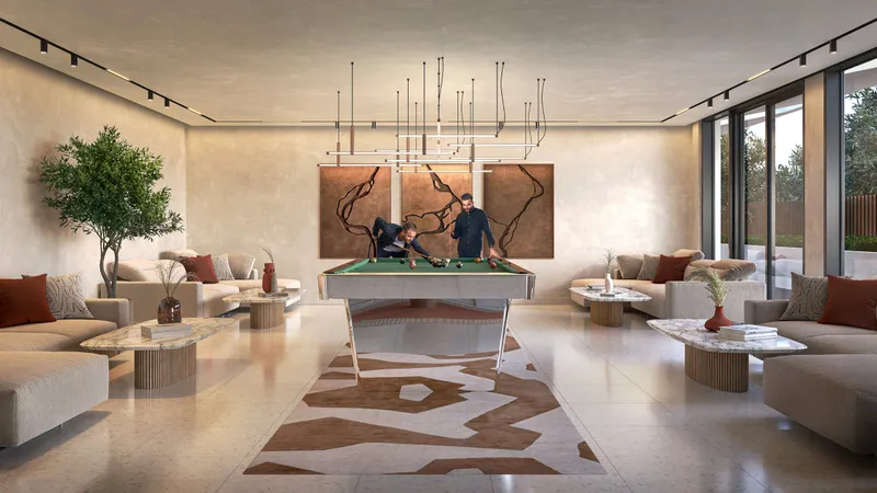 Render of the residents' multipurpose club at Alder with a pool table and lounge seating
