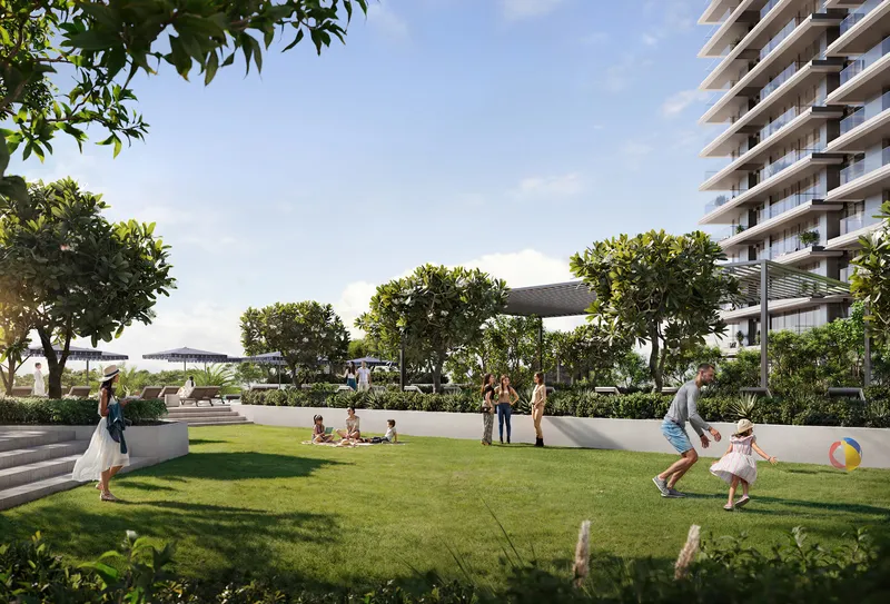 Render of families on the communal lawn at Altan beside the residential building