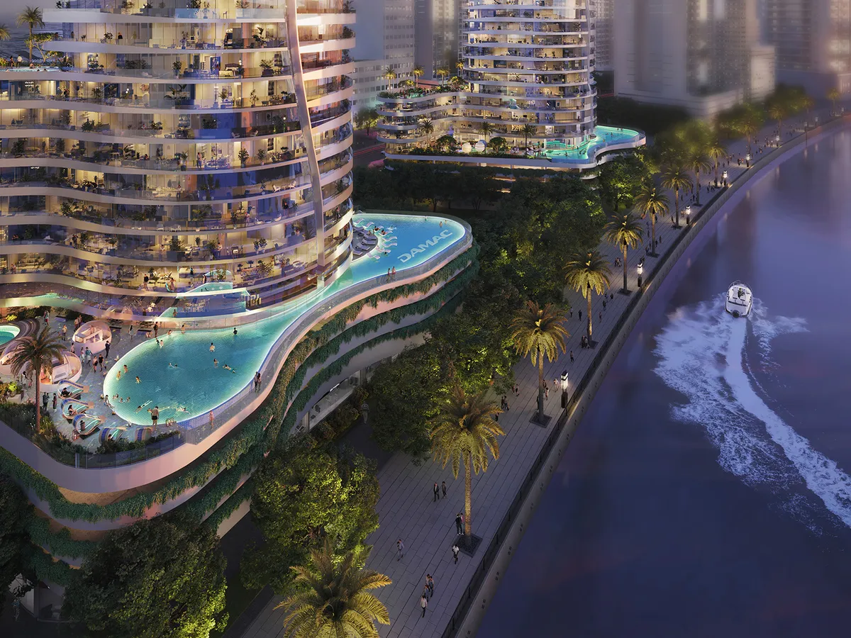 Podium pool decks of Altitude de GRISOGONO above the canal promenade at dusk