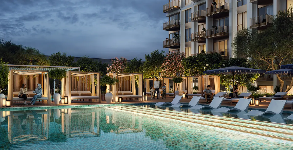 Render of the Altus swimming pool at dusk with cabanas and sun loungers