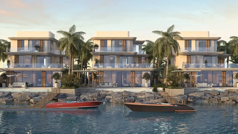 Waterfront villas at Anantara Residences Mina with private boat docks on the canal