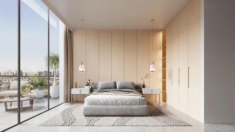 Bedroom with timber wall panelling, fitted wardrobes and a balcony beyond full-height glazing at Antalya by Karma