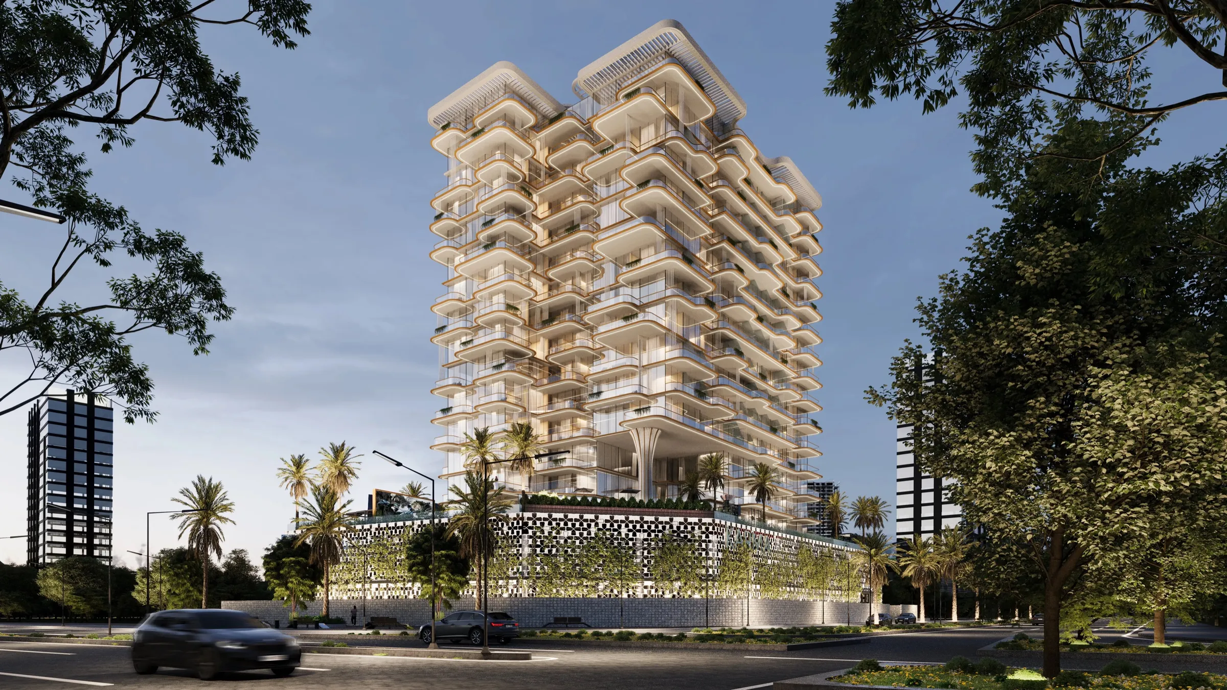 Antalya by Karma at dusk, an 18-storey tower with curved white balconies above a patterned podium