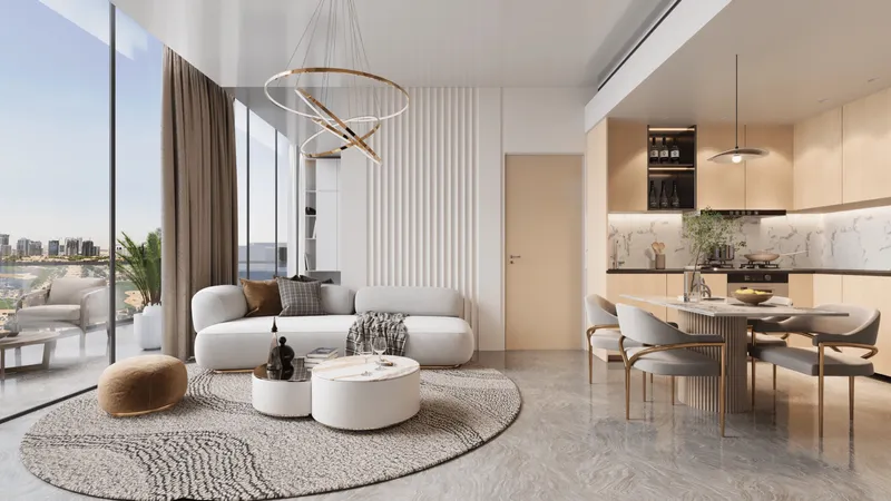 Open living room and kitchen with a curved sofa, a round rug and full-height windows in an Antalya by Karma apartment