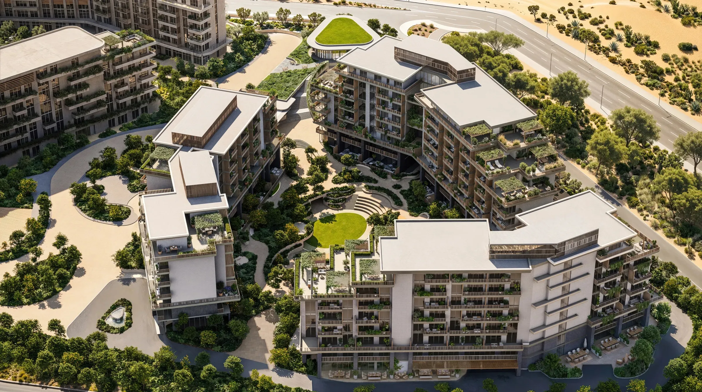 Aerial render of the three low-rise Arancia Yards buildings around a central landscaped garden in City of Arabia, Dubai