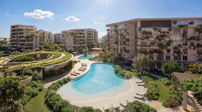 Free-form swimming pool with sun loungers in the landscaped courtyard of Arancia Yards