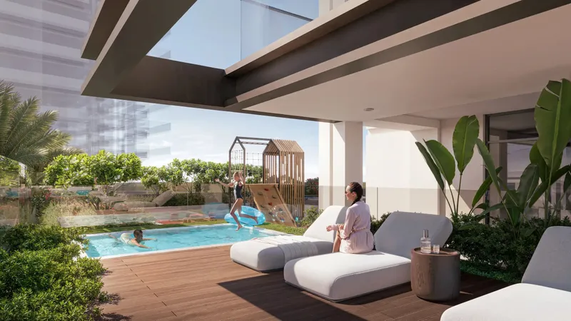 Kids' pool and shaded loungers at AUREL1A Residence