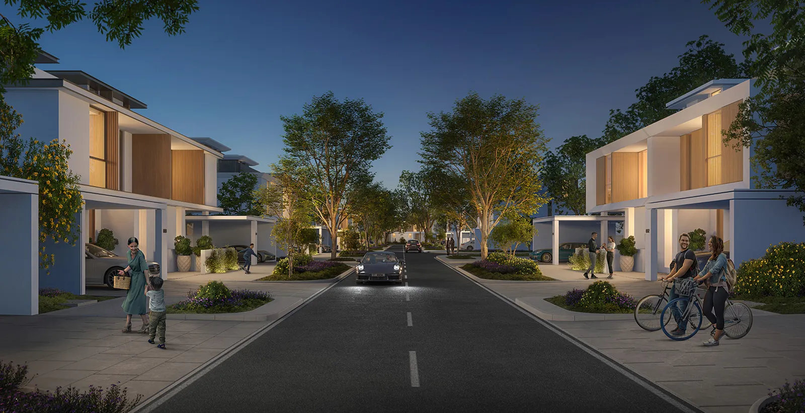 Render of a street of Avena 2 villas at dusk with covered parking and street trees