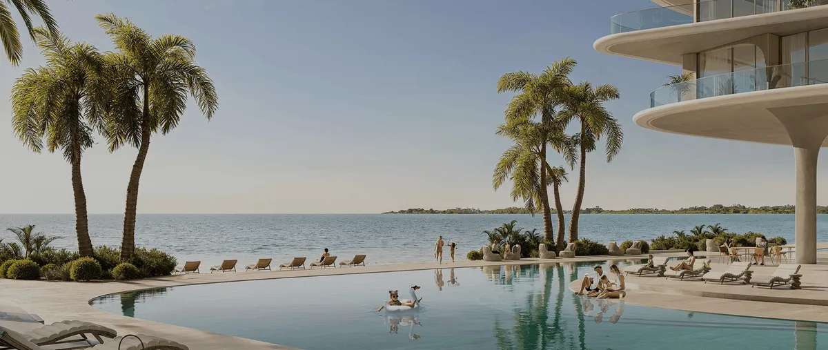 Render of the infinity pool at AYA Beachfront Residences, with palm trees and the sea beyond