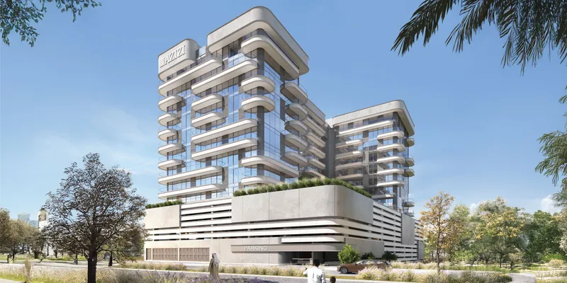 Render of the Azizi Amir apartment building in Al Furjan, with curved balconies above the parking podium