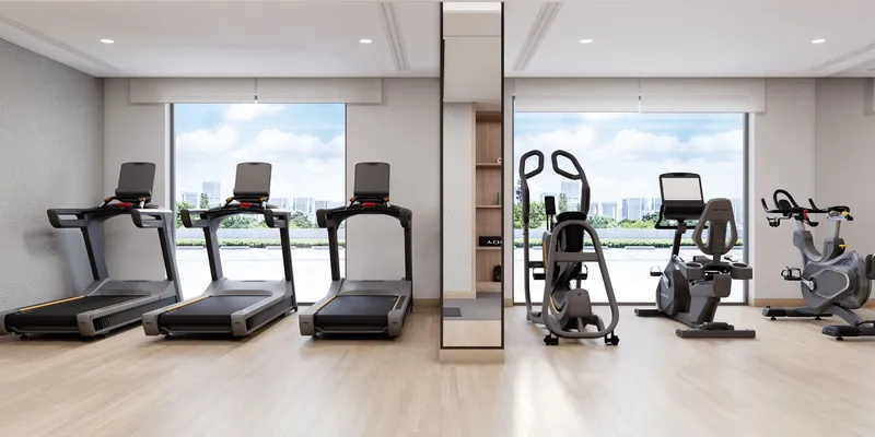 Render of the gym at Azizi Arian with treadmills facing the windows