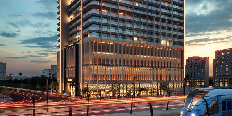 Render of the podium and ground-floor shops of Azizi Arian at dusk