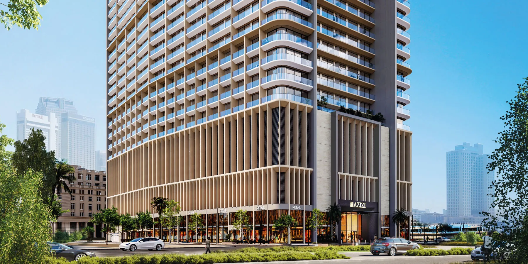 Render of the Azizi Arian apartment tower in Jebel Ali from the street, with shops on the ground floor