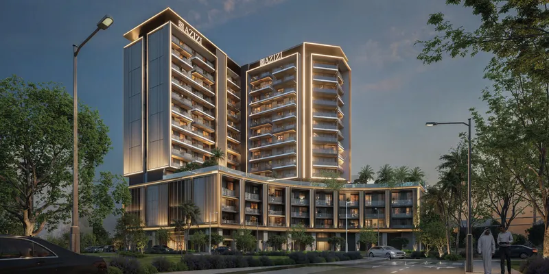 Render of Azizi Gabriel lit at dusk, with two towers above a curved podium