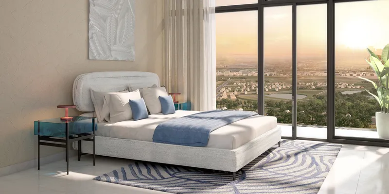 Render of a bedroom with full-height windows in an Azizi Grand apartment