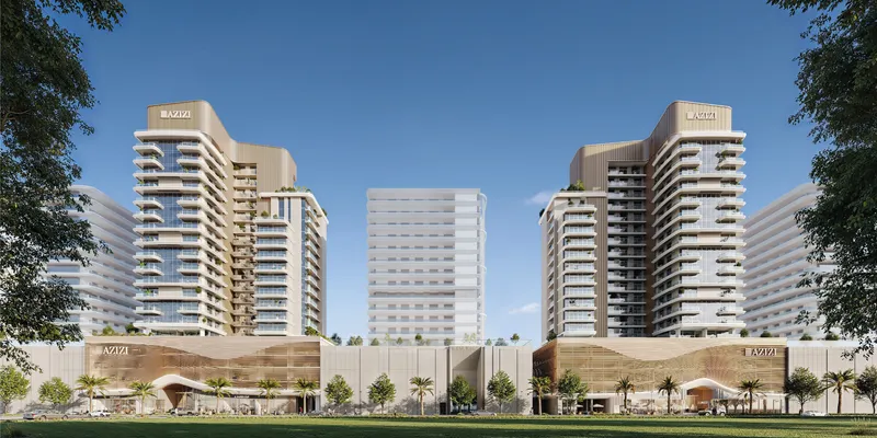 Front render of Azizi's Al Jaddaf towers with curved balconies and a shared podium