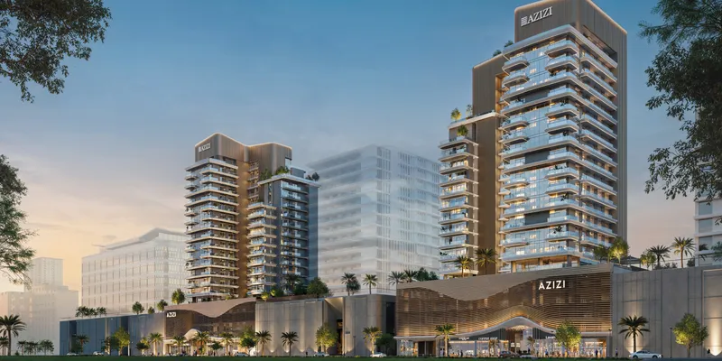 Evening render of Azizi's Al Jaddaf towers and the shops along the podium