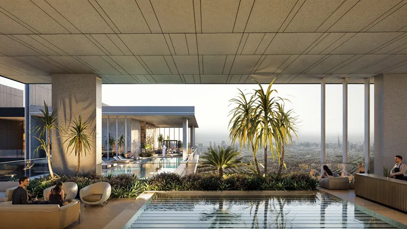 Render of a covered pool lounge with planting and seating at Azizi Milan Heights