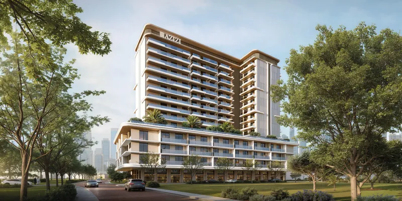Render of the Azizi Noura apartment building in Jebel Ali seen from the street, framed by trees